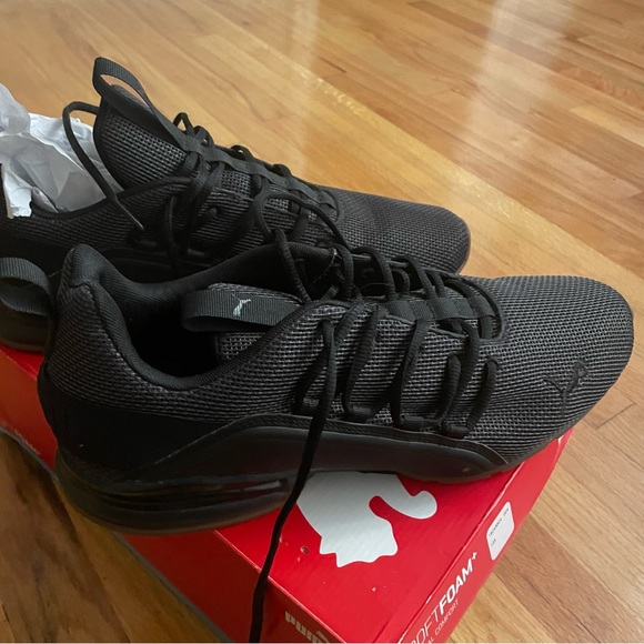 Puma Axelion Mesh Athletic Sneaker
Black Running Size 13 Men’s only worn once - Picture 4 of 8